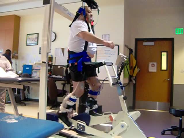 Video of client with electrical stimulation on a stair stepper